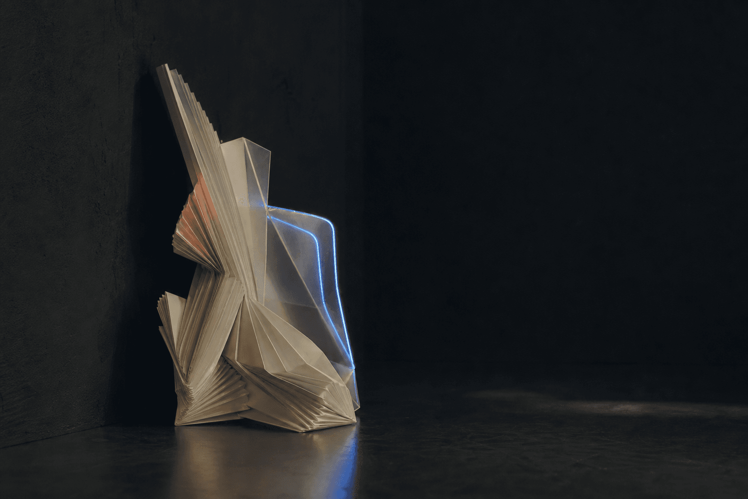 Folded material study with a blue illuminated edge